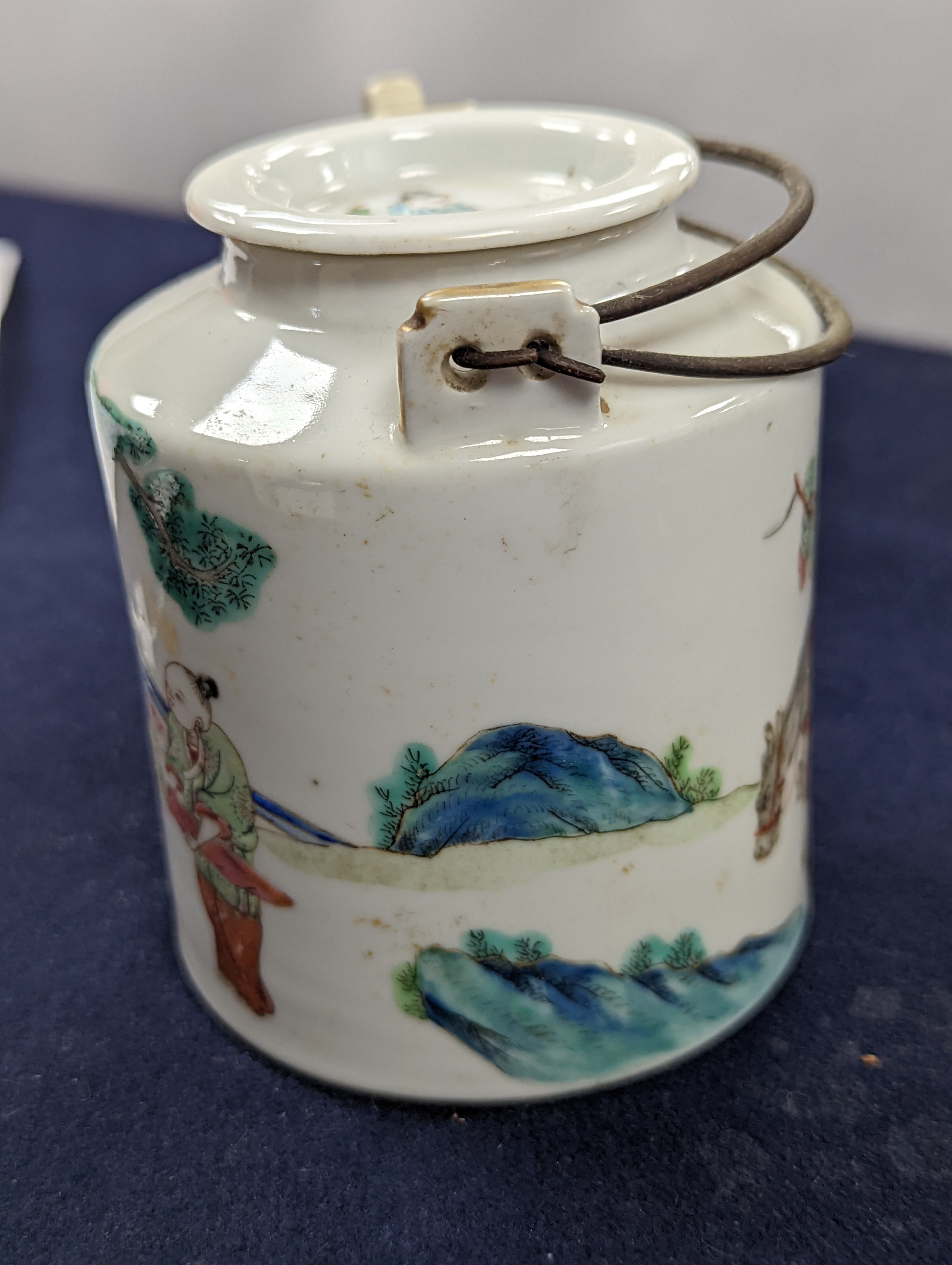 A Chinese famille rose cylindrical teapot and cover, 19th century 11cm, wood stand